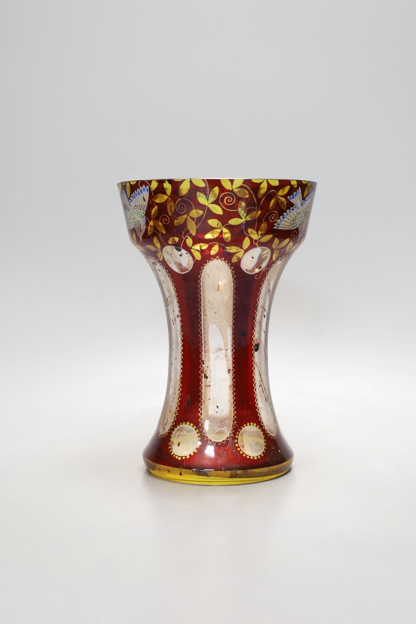 An American? enamelled glass vase and a ruby glass bowl, bowl 23.5 cms diameter.